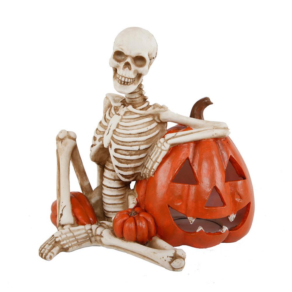 Flora Bunda 9 In. X 7 In. Halloween Lighted Polyresin Skeleton And Orange Pumpkin With Color Changing LED Lights 3 Flora Bunda 9 In. X 7 In. Halloween Lighted Polyresin Skeleton And Orange Pumpkin With Color Changing LED Lights